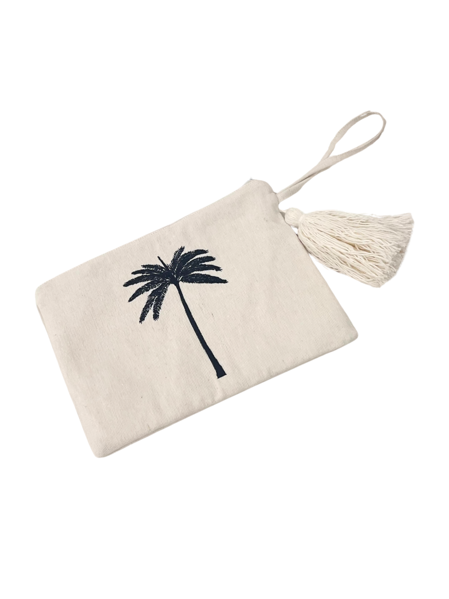 Coastal pouch accessory with white tassel and black embroidered palm