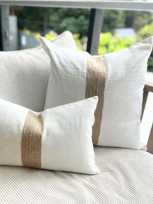 white natural linen cushions with raffia detail